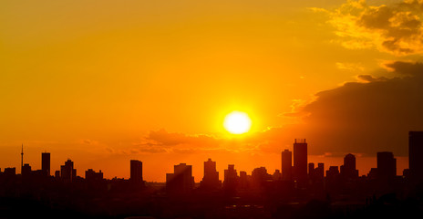 Fototapeta na wymiar Silhouette City Sunset in Johannesburg South Africa