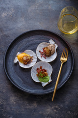 Grilled scallops shell with pumpkin and snow peas and chestnut