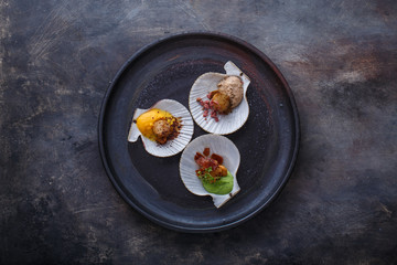Top view of fried scallops on a plate, restaurant dish copy space