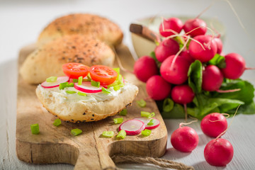 Closeup of sandwich with bread, radish and fromage cheese