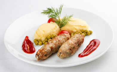 Children's menu. Veal chops with mashed potatoes. On white background