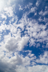 Clouds against blue sky as abstract background