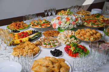 decoration of the festive buffet table, decorations and snacks, sweets and drinks