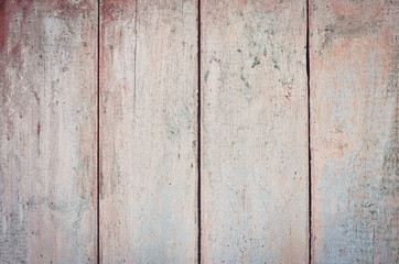 Rustic wooden background with light pink weathered planks.