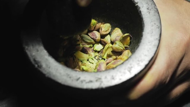Pistachio hand grinding
