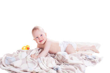 Happy little baby boy smiling and crawling