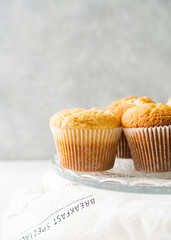 Homemade tasty miffins on white background, close up