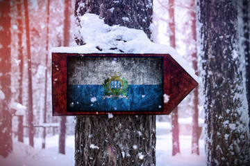 The San marino flag attached to the tree as a sign.