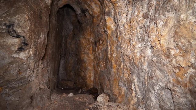 Uranium ore in a uranium mine. Rock containing uranium and barite.