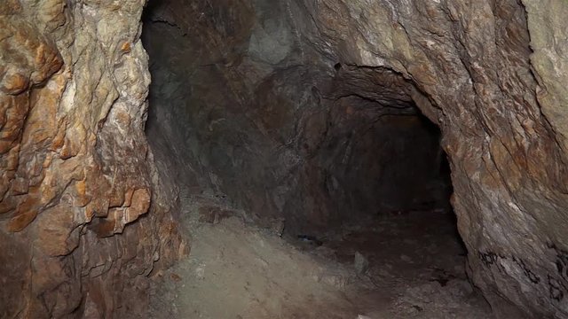 Uranium ore in a uranium mine. Rock containing uranium and barite.