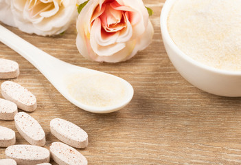 Pills and collagen protein powder - Hydrolyzed. Space for text