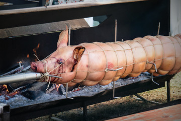 Porchetta. It is a savoury, fatty, and moist boneless pork roast of Italian culinary tradition