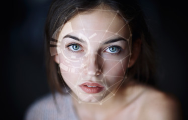 Biometric face detection. Portrait of a very beautiful girl.