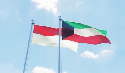 Indonesia and Kuwait, two flags waving against blue sky. 3d image