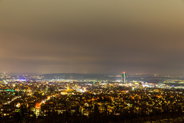 Obraz premium Germany, City lights of fellbach from above in cold winter night