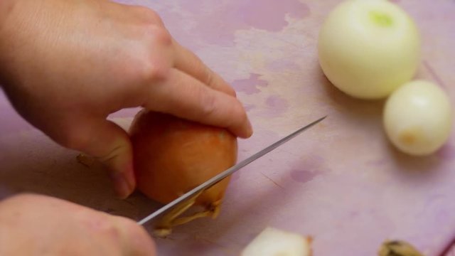Pelling An Onion With Knife