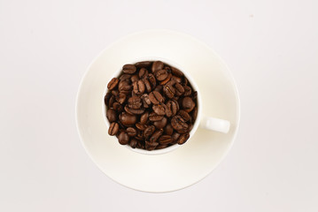 Cup of coffee and coffee beans.