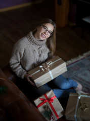 Girl preparing Christmas gifts