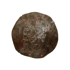 Concave ancient copper or bronze byzantine coin isolated on white