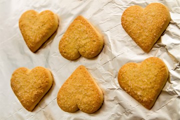 flatlay of heart shaped fresh baked cookies as a symbol of St. Valentine's Day