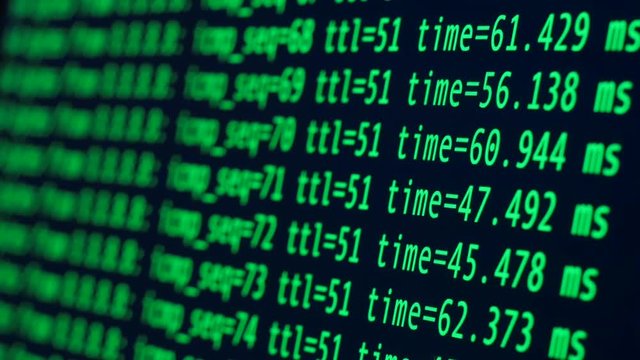 Command terminal on the computer screen. Green lines of code on a black background. Information Technology.