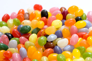 Fototapeta na wymiar Colorful jelly beans candies on white background