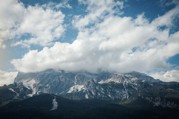 Fototapeta na wymiar Rocky Mountain Range in Clouds