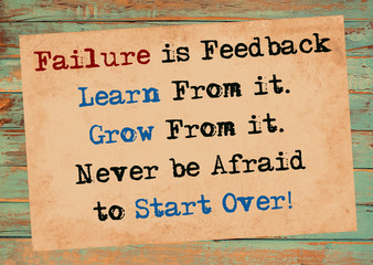 Failure is Feedback Motivational Saying on Paper
