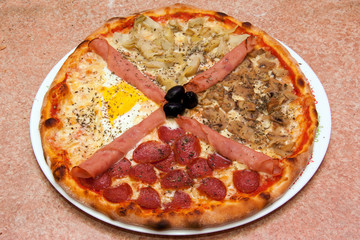 Close Up Of Fresh Pizza Four Seasons On The Plate, Marble Background