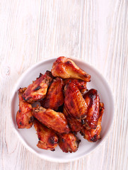 Roast chicken wings in a plate,