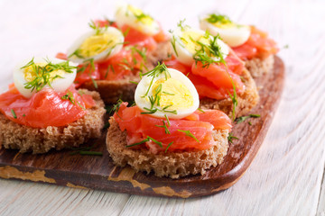 Snacks with salmon, quill egg