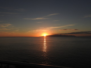 sun setting over the sea