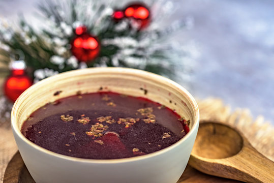 Traditional Polish soup made of red beetroot - red borsch - christmas decorations