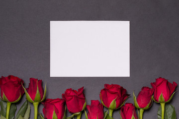 Valentines day background, seamless black background, red roses,  empty note card, free copy text space