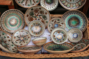 Traditional painted ceramic dishes for sale on one of the  markets in Sighisoara, Romania.