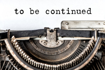 To be continued typed words on a vintage typewriter. Close up