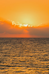 Colorful dawn over the sea, Sunset. Beautiful magic sunset over the sea. vertical photo.