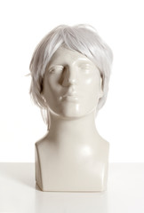 Fototapeta premium Mannequin Male Head with Wig on White
