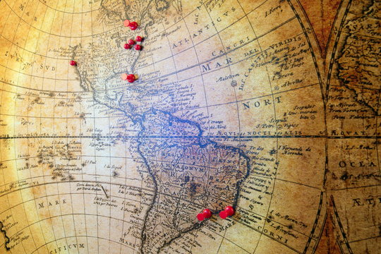 Retro and vintage map.Old illustration of ancient atlas map of world on old paper.Pin marking location on map. Adventure and travel theme background - Image
