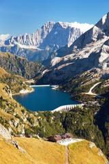 Fototapeta na wymiar View of lago di Fedaia and mount Civetta, Dolomiti