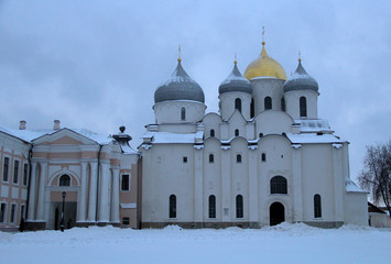 Fototapeta na wymiar Old Russian architecture in snow in winter