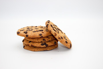 Oatmeal cookies with chocolate drops isolated on white background