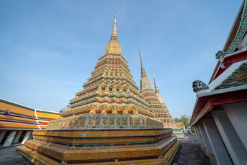 Fototapeta premium Towers at Wat Po Temple in Bangkok, Thailand