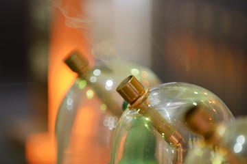 Glass flasks for vapers. Vaping whiskey. Evaporator of whiskey for the use of the drink in the form...