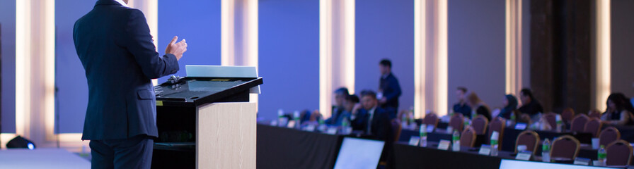 Speaker During Lecture at Tech Business Seminar. Audience at Conference Hall. Business...