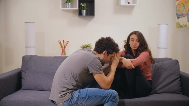 cheater husband asks forgiveness for his sad and disappointed wife