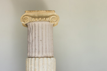 ancient Greece history museum tourist and sightseeing concept, marble column antique architecture example exhibit object on white wall background, copy space
