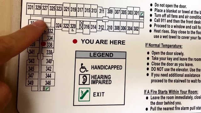 Man is studying an evacuation plan