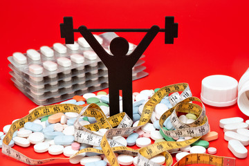 weight lifting pictogram with pills, tape measure