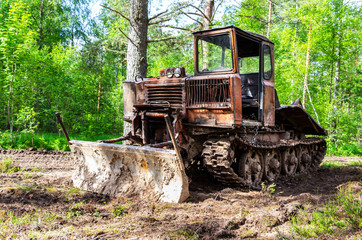 Fototapeta na wymiar Skidding tractor for timber industry at the forest